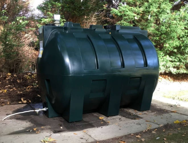 Green Plastic Tank Installation On Concrete